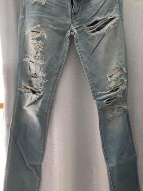 WoMen's Distressed Light Blue Slim Fit Jeans